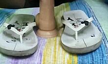 giving footjob with dildo in torn pantyhose, masturbating doggystyle