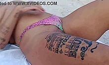 Exhibiting at the beach with a hot blowjob.