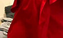 Brunette in red lingerie plays with herself