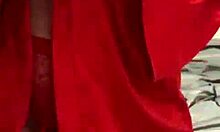 Brunette in red lingerie plays with herself