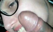 This beautiful brunette is sucking her boyfriend's big black cock so eagerly