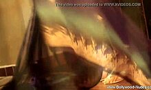 Mature brunette actress strips and rips clothes