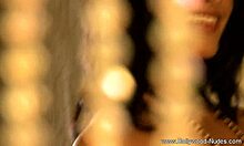 Mature brunette actress strips and rips clothes