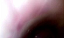 camera captures her wet pussy as she thrusts an 8-inch dildo deep inside herself for intense pleasure