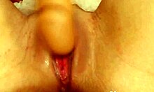 hot redhead babe toys herself close-up on webcam