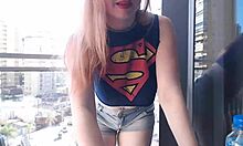 Sexy Redhead Teen Gamer Girl Flashes Her Big Tits On Outdoor Balcony For Voyeurs