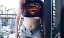 Sexy Redhead Teen Gamer Girl Flashes Her Big Tits On Outdoor Balcony For Voyeurs
