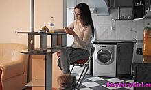 stripping jeans off and fingering on a chair