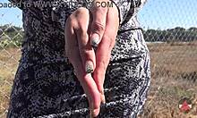 Sexy finger nails fetish outdoors.