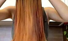 Young Russian Redheaded Bitch Moves Sexually In Front Of The Camera