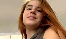 Young Russian Redheaded Bitch Moves Sexually In Front Of The Camera