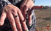 Sexy finger nails fetish outdoors.