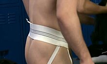 Guy sucking three cocks in locker room?