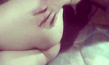 She's giving you a great view while rubbing her pussy at home