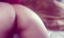 She's giving you a great view while rubbing her pussy at home