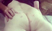 She's giving you a great view while rubbing her pussy at home