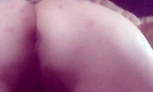 She's giving you a great view while rubbing her pussy at home