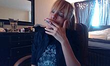 Sandi lights up 3 brown cork cigarettes, smoking seductively while teasing with her big tits.