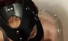 masked brunette gags on cock in bathroom doggystyle and cumshot