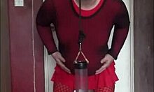 sissy crossdresser swallows piss, doesn't care who watches!