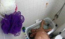 candy cruise relaxes in bathtub scene