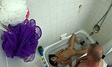 candy cruise relaxes in bathtub scene