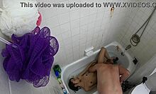 candy cruise relaxes in bathtub scene