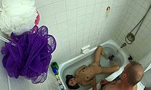 candy cruise relaxes in bathtub scene