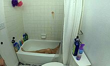 candy cruise relaxes in bathtub scene