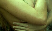 I watch this frisky babe washing her naked boddy.