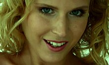 Look at those huge natural tits on the blonde bombshell! She's masturbating naked.