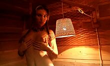 Stunning teen poses naked in bedroom under red lights