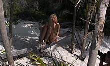 damn, busty babe goes wild, posing fully naked by a palm tree on beach