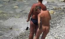 athletic short hair milf gets naked for tanning and relaxation on the beach