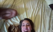 Busty brunette kneels for blowjob and cum in mouth