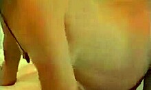 Short-haired pregnant brunette enjoys oral and doggy position.