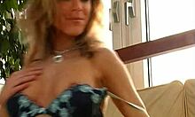 Skinny blonde enjoys solo time in the bedroom