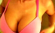 huge tits babe teasing her own boobs