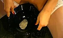 busty brunette enjoys bukkake breakfast on her knees