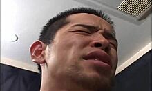 two young asian dudes heat up with handjobs during work