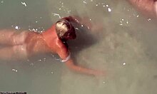 horny dude plans to surprise his nudist girlfriend underwater.