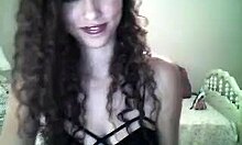 Frizzy hairdo camgirl, are you showing those beautiful jugs?