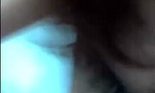 Asian girlfriend explores intimate moments with a large toy in close-up, wearing stockings and glasses.