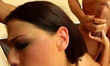 hey, this dark-haired slut in white heels is giving handjobs, deepthroats, and fucking her ass with double penetration