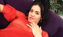 Hey, wanna see this horny brunette in red get her pussy slammed?