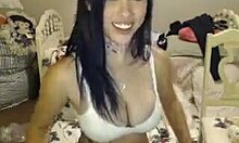 Camgirl in white bra drinks soda while flashing big natural tits