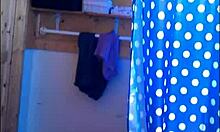 Dark-Haired Pale Hottie Reveals Pussy After Shower on Hidden Cam