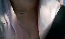 gorgeous chick flashes her pussy looking hot in changing room