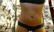 Watch my girlfriend masturbate in the office? She slides her hand into her panties.