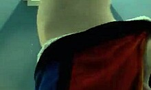 gorgeous chick flashes her pussy looking hot in changing room